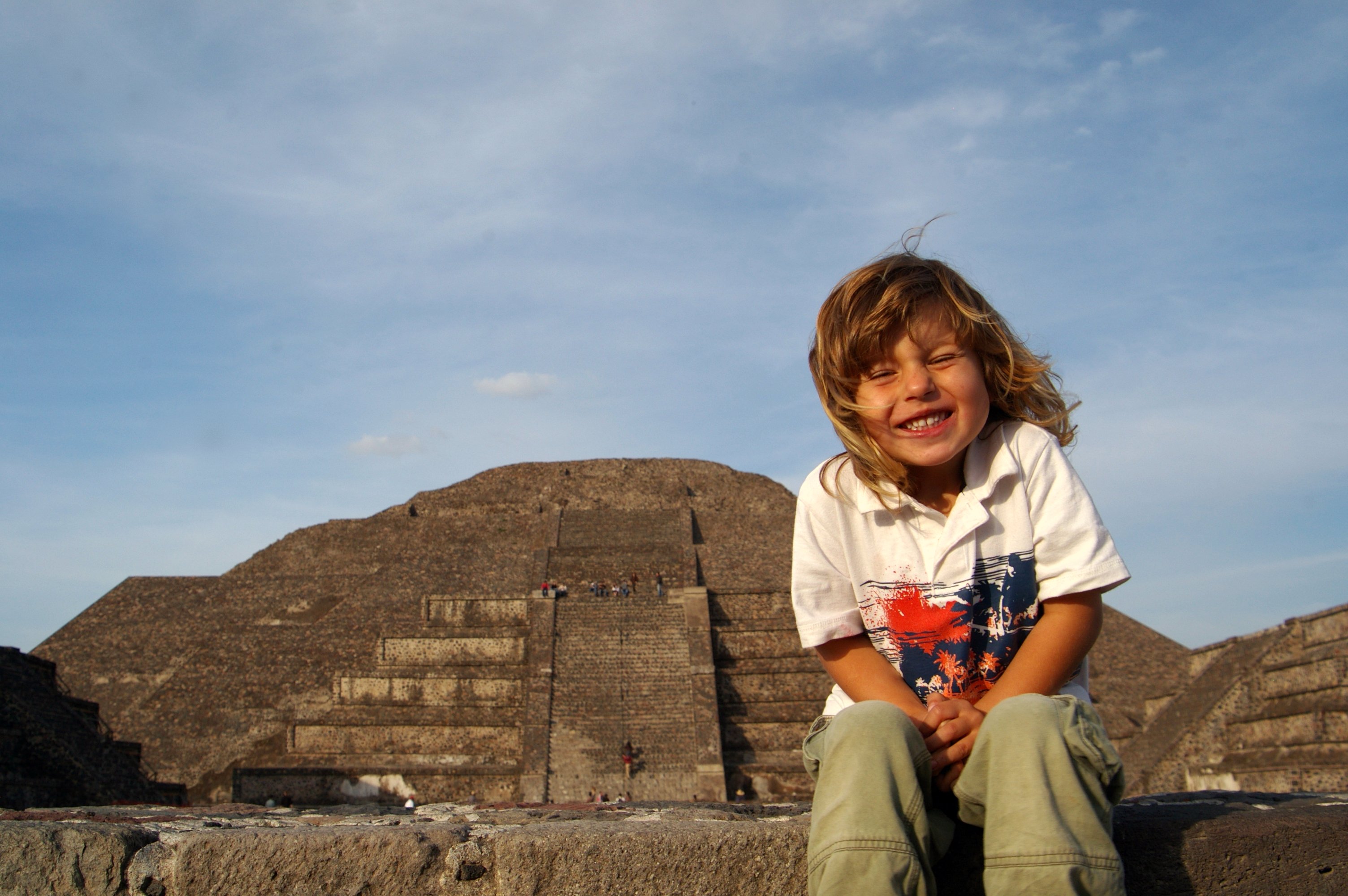 Alex sitting in front of the Pyramid of the Sun